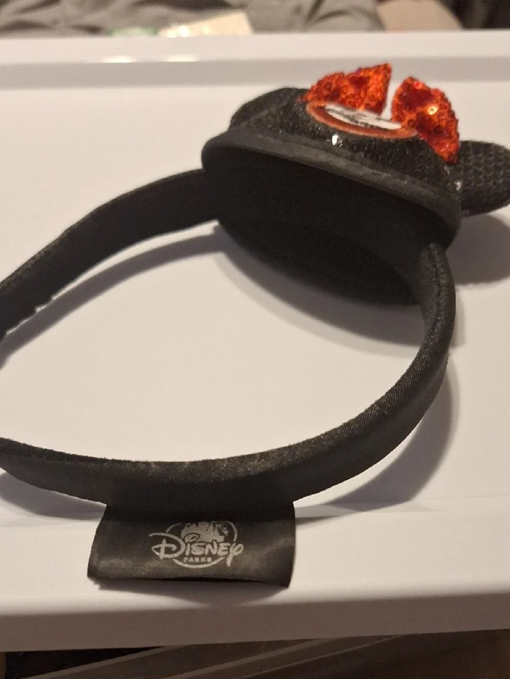 Disney Black Sequin Minnie Ear Headband with Orange Sequin Bow